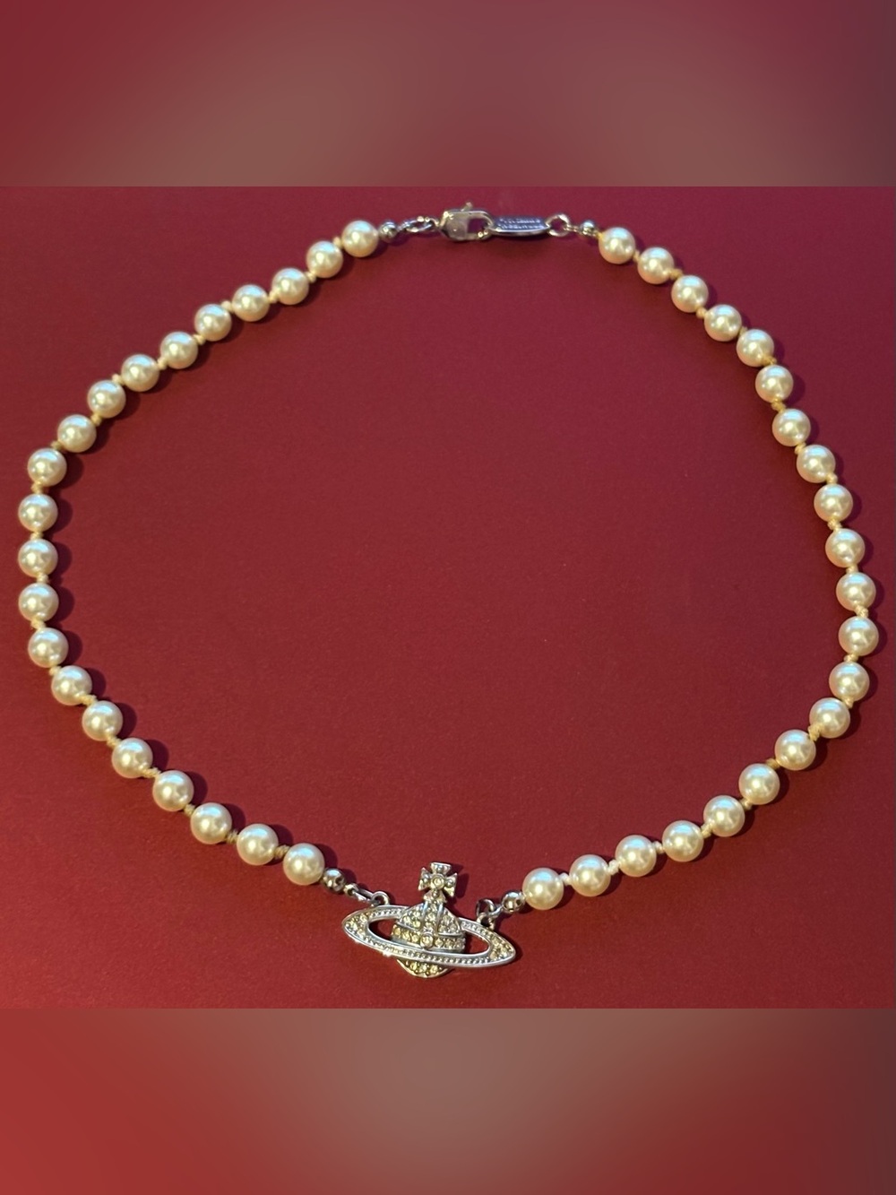 Vivienne Westwood Ivory Pearl Necklace with Crystal Orb Pendant
